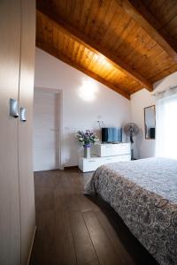 Postel nebo postele na pokoji v ubytování Dicentra Guest House + 19 fotografií