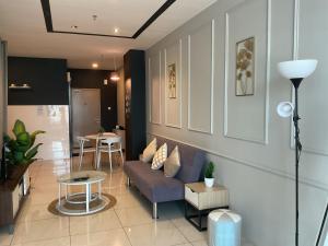 Χώρος καθιστικού στο Borneo Hideaway - Manhattan Suites, ITCC