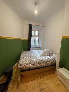 Ένα ή περισσότερα κρεβάτια σε δωμάτιο στο The Cozy Green