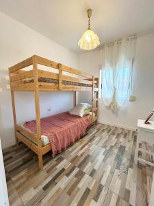 Ένα ή περισσότερα κρεβάτια σε δωμάτιο στο Deniahome Angie