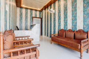 Χώρος καθιστικού στο Hotel O Saanvi Residency Inn a Ganga View +22 φωτογραφίες