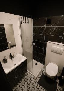 Koupelna v ubytování Cozy Mood Apartment in Old Town