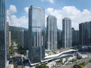 an image of a tall building in a city at Courtyard by Marriott Zhuhai in Zhuhai