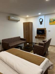 TV a/nebo společenská místnost v ubytování Hotel Central Point