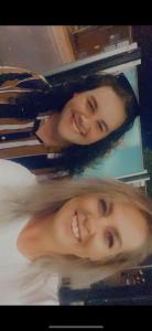 two young women are posing for a picture at Soulful healing academy in Point Cook