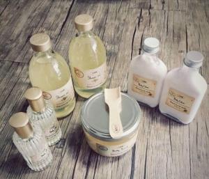 a group of different bottles on a wooden table at Soulful healing academy in Point Cook +1 photo