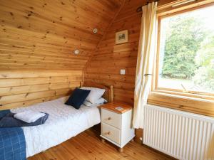 Postel nebo postele na pokoji v ubytování Pen Y Clawdd