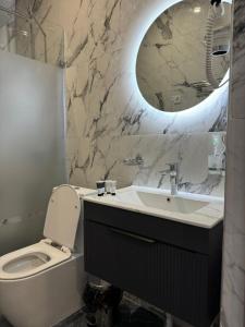 Koupelna v ubytování Hotel Turkistan Restaurants