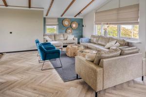 Χώρος καθιστικού στο Familie-Beachvilla Ooster-schel-de