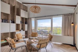 Χώρος καθιστικού στο Familie-Beachvilla Ooster-schel-de