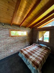 Ένα ή περισσότερα κρεβάτια σε δωμάτιο στο Mirador de la montaña