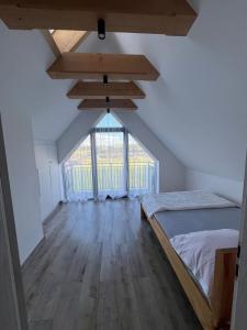 Postel nebo postele na pokoji v ubytování Mery House Agroturystyka