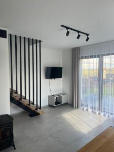 TV a/nebo společenská místnost v ubytování Mery House Agroturystyka + 9 fotografií