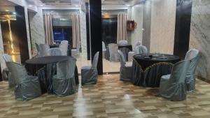 Posezení v ubytování hotel daksh + 1 fotografie