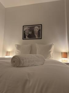 Giường trong phòng chung tại La suite du parc 2