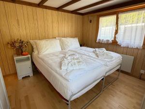 Postel nebo postele na pokoji v ubytování Chalet Montana mit Bergblick