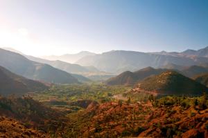 a view of a valley with mountains in the background at villa lalla Ourika & heated pool in Oulad Akkou +1 photo