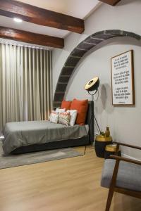 a bedroom with a bed in a room at GuestReady - Casa das Arcadas in Ponta Delgada +39 photos