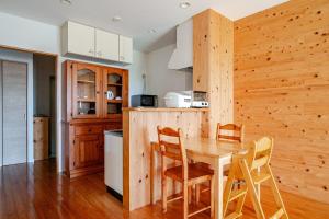 Kuchyň nebo kuchyňský kout v ubytování お子様連れ&動物好き大歓迎！産みたての卵を収穫体験できる宿