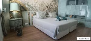 Postel nebo postele na pokoji v ubytování Oasis de Bornos Chambres + 37 fotografií