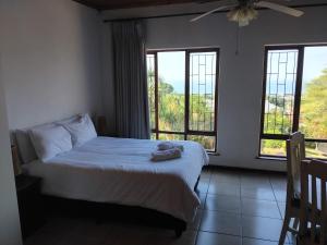 Ένα ή περισσότερα κρεβάτια σε δωμάτιο στο Sea Vista - awesome sea views