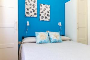 Ένα ή περισσότερα κρεβάτια σε δωμάτιο στο 600m from the beach - Garden and Sea View