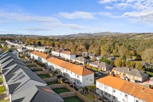 an aerial view of a small town with houses at Sidlaw View in Dundee