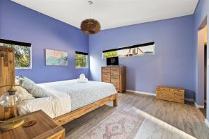 Ένα ή περισσότερα κρεβάτια σε δωμάτιο στο Perry's Place