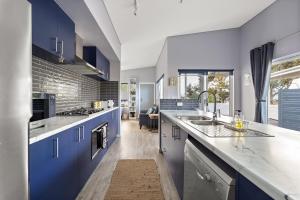 Η κουζίνα ή μικρή κουζίνα στο Perry's Place