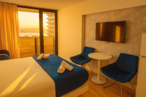 Μια τηλεόραση ή/και κέντρο ψυχαγωγίας στο Orbi City Panorama Hotel In Batumi