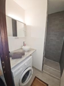 Koupelna v ubytování Au dessus des nuages Sublime Vue + 6 fotografií