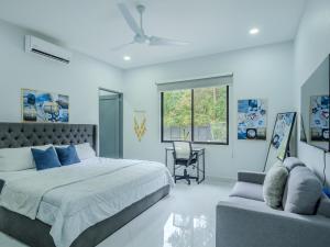 Voodi või voodid majutusasutuse Modern Retreat In The Rainforest With River Access toas +61 fotot