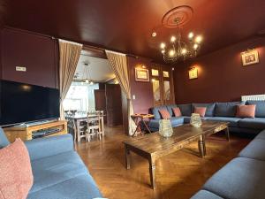 Posezení v ubytování Dolce Villa Pool and Wellness