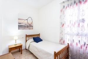 Postel nebo postele na pokoji v ubytování Home2Book Warm Family Stay Güimar