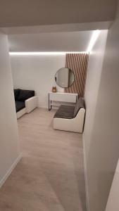 Χώρος καθιστικού στο Pilsētas sirds apartamenti +31 φωτογραφίες