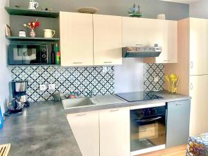 Η κουζίνα ή μικρή κουζίνα στο Le Petit Chambonnais, confort et calme