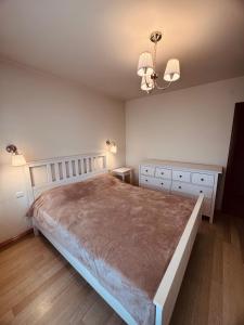 Ένα ή περισσότερα κρεβάτια σε δωμάτιο στο Apartament ultracentral Botanica +6 φωτογραφίες