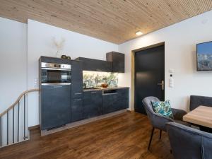 Η κουζίνα ή μικρή κουζίνα στο Appartement Musik Neureiter +14 φωτογραφίες