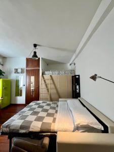 Postel nebo postele na pokoji v ubytování Maison Ringhiera