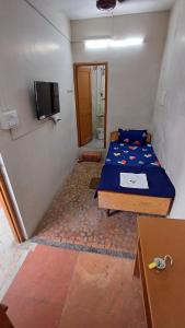 TV a/nebo společenská místnost v ubytování Swamy Residency + 8 fotografií