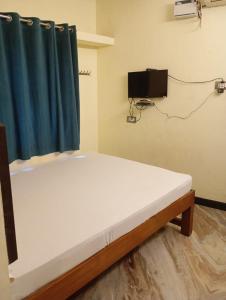 Et tv og/eller underholdning på Thirumala palace