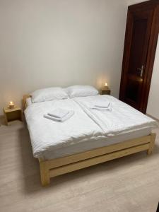 Postel nebo postele na pokoji v ubytování Lux Konštantínova