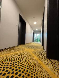 Ένα ή περισσότερα κρεβάτια σε δωμάτιο στο Eclipse Budget Rooms