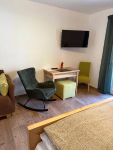 TV a/nebo společenská místnost v ubytování Gesäuse-Zimmer