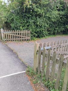 a wooden fence on the side of a road at 28 Clifford Road in Whitstable +23 photos