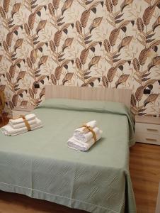 Postel nebo postele na pokoji v ubytování Taxi House Aereporto Costa D'Amalfi