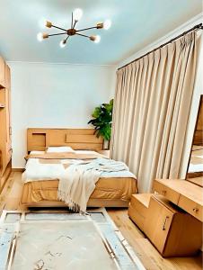 Postel nebo postele na pokoji v ubytování 2Bedroom Apartment and Living Room at Shiekh Zayed