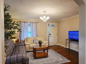 TV a/nebo společenská místnost v ubytování Gather at the Cape