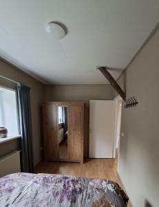 Ένα ή περισσότερα κρεβάτια σε δωμάτιο στο De Kalverstal