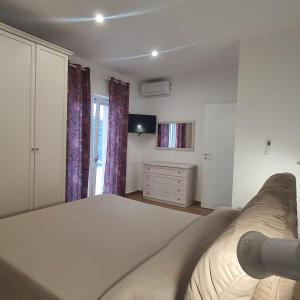 Postel nebo postele na pokoji v ubytování Villa MelVin